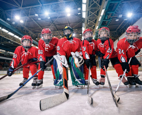 Kids hockey team sports team travel in Calgary.